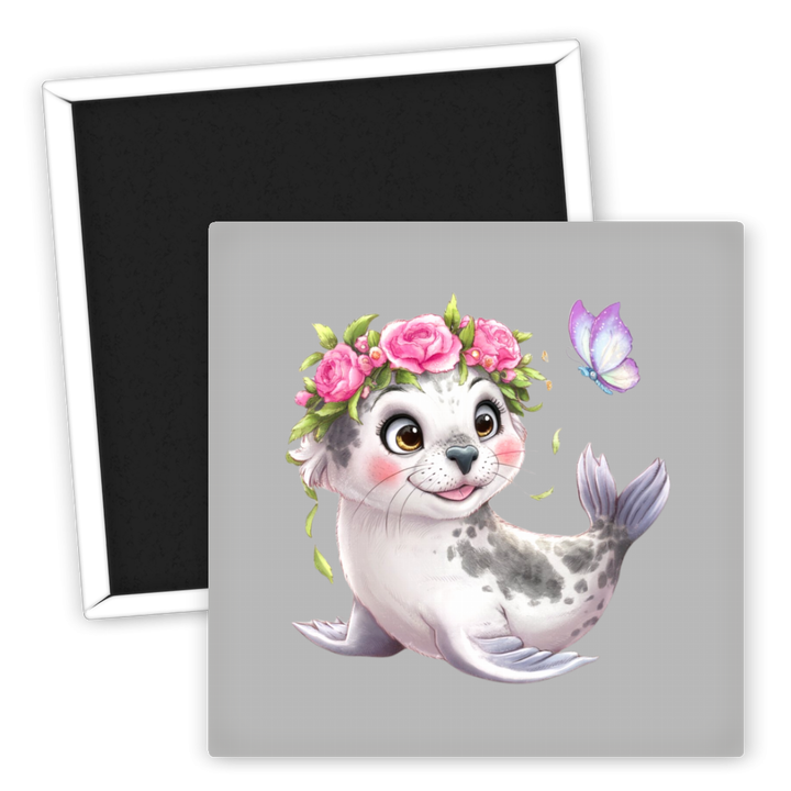 Zum Produkt Süßer Seehund Kühlschrankmagnet mit Blumenkranz und Schmetterling