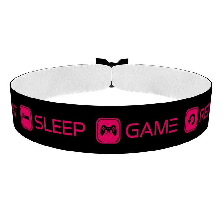 Zum Produkt Eat Sleep Game Repeat schwarz/pink Stoffarmband