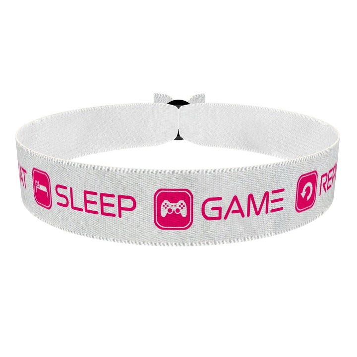 Zum Produkt Eat Sleep Game Repeat weiß/pink Stoffarmband