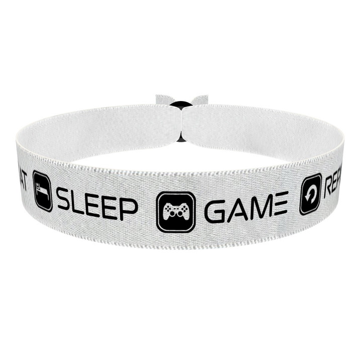Zum Produkt Eat Sleep Game Repeat weiß/schwarz Stoffarmband