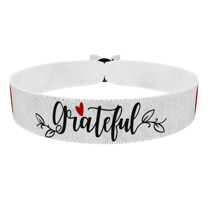 Zum Produkt Grateful schwarz/weiß Stoffarmband