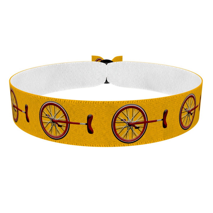 Zum Produkt Einrad gelb Stoffarmband