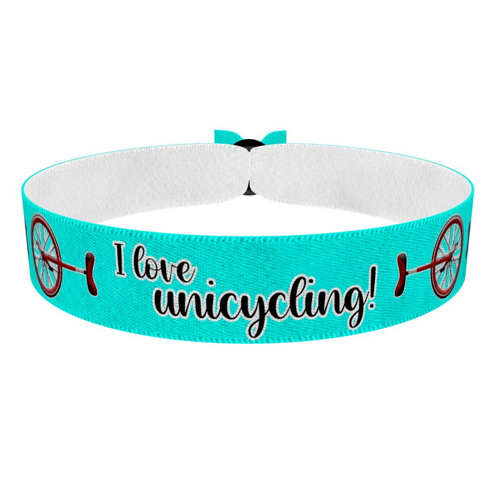 Zum Produkt I love unicycling türkis Stoffarmband