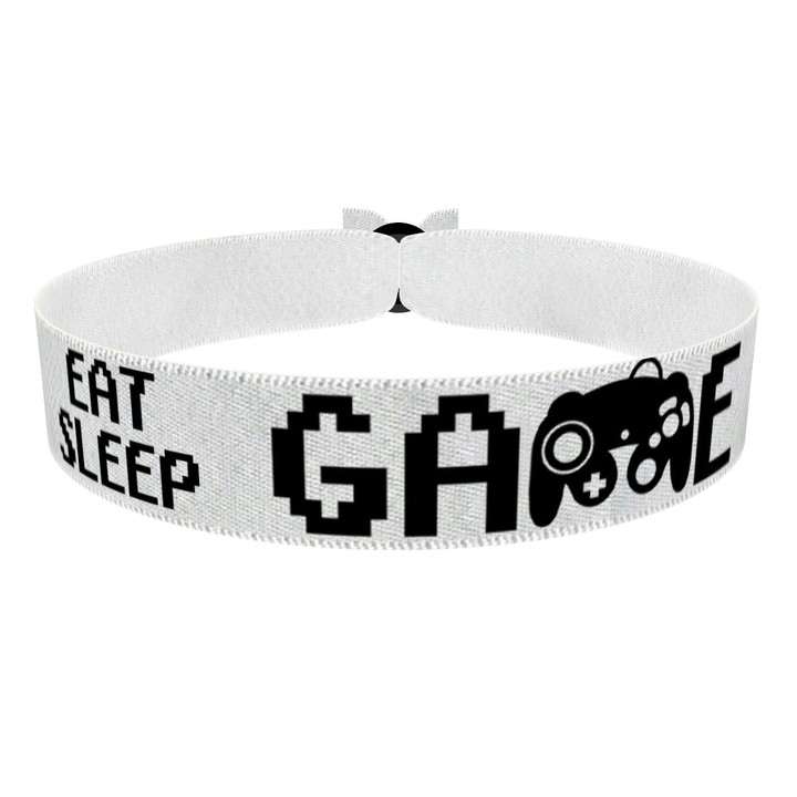 Zum Produkt Eat Sleep Game weiß Stoffarmband