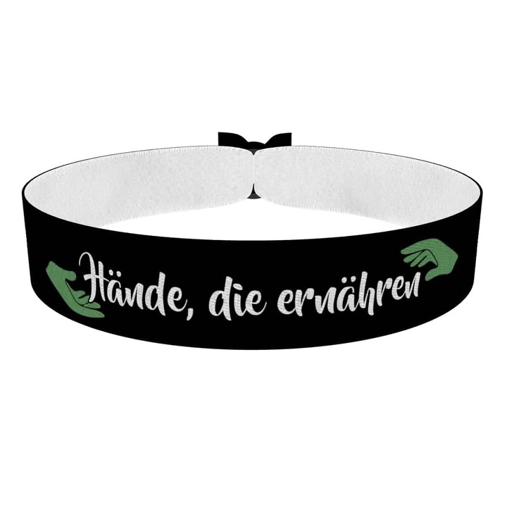 Zum Produkt Hände, die ernähren Stoffarmband
