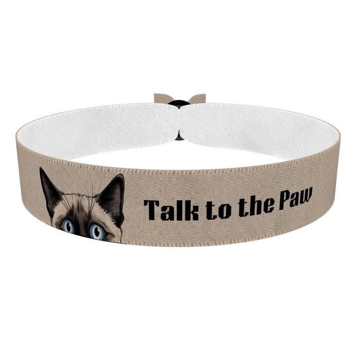 Zum Produkt Stoffarmband mit Katzenmotiv Talk to the Paw für Katzenliebhaber