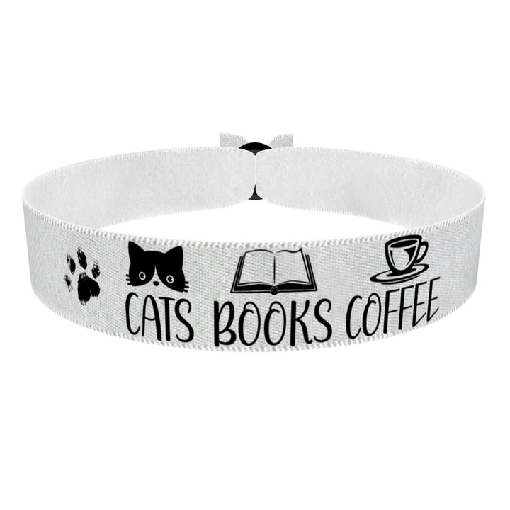 Zum Produkt Stoffarmband Katzenliebhaber mit Katzen und Pfotenmotiven