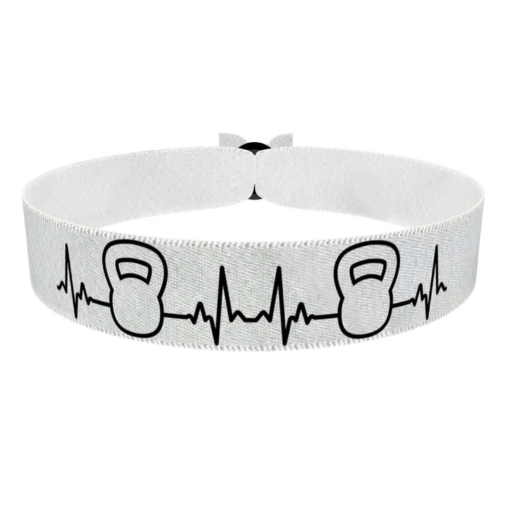Zum Produkt Fitness Stoffarmband mit Kettlebell Motiv für Sportbegeisterte