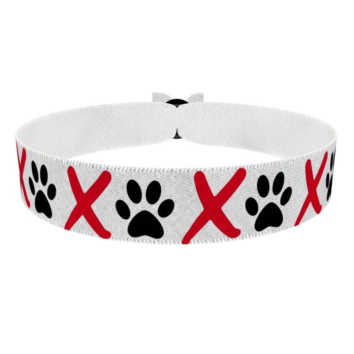Zum Produkt Stoffarmband mit Hundepfotenmotiv für Hundeliebhaber