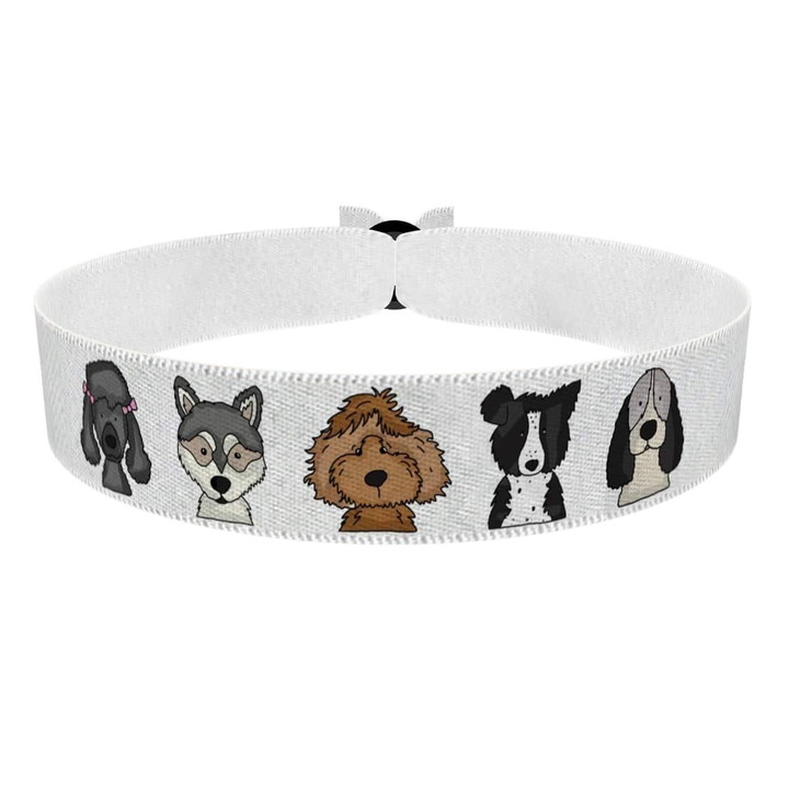 Zum Produkt Stoffarmband mit süßen Hunde-Motiven für Hundeliebhaber