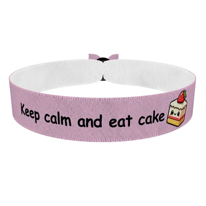 Zum Produkt Stoffarmband mit Motiv Keep calm and eat cake