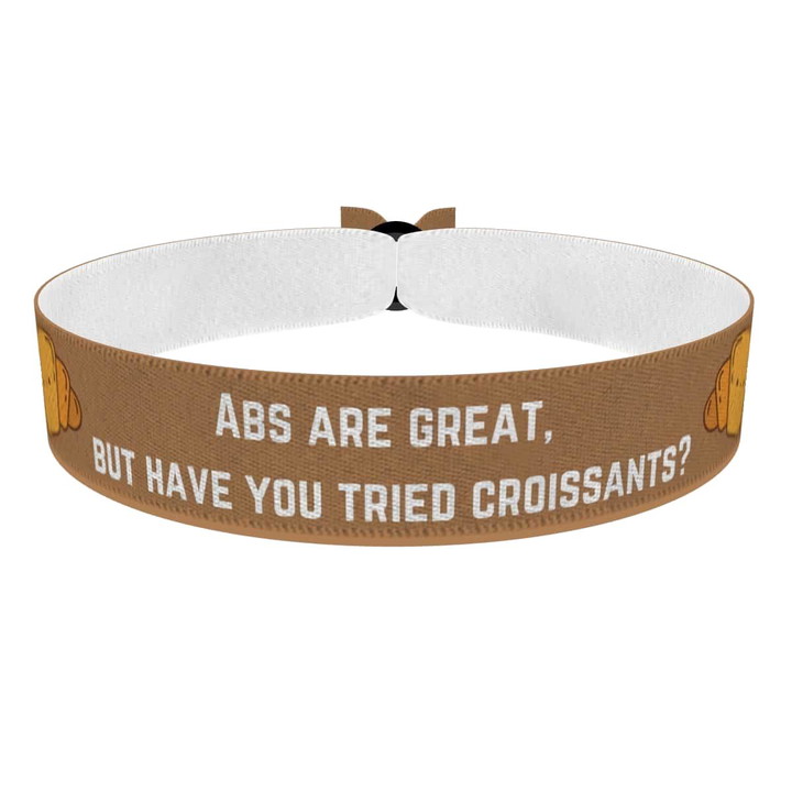 Zum Produkt Stoffarmband mit Croissant Motiv für Food & Drinks Liebhaber