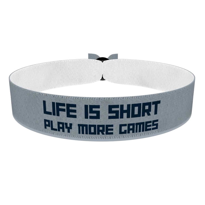 Zum Produkt Stoffarmband Life is Short Play More Games für Gamer