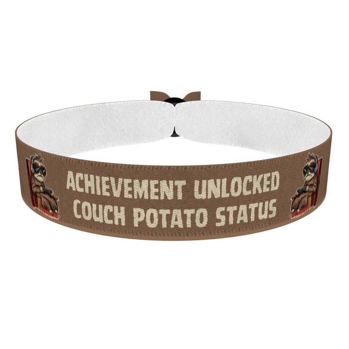Zum Produkt Stoffarmband Achievement Unlocked Couch Potato Status