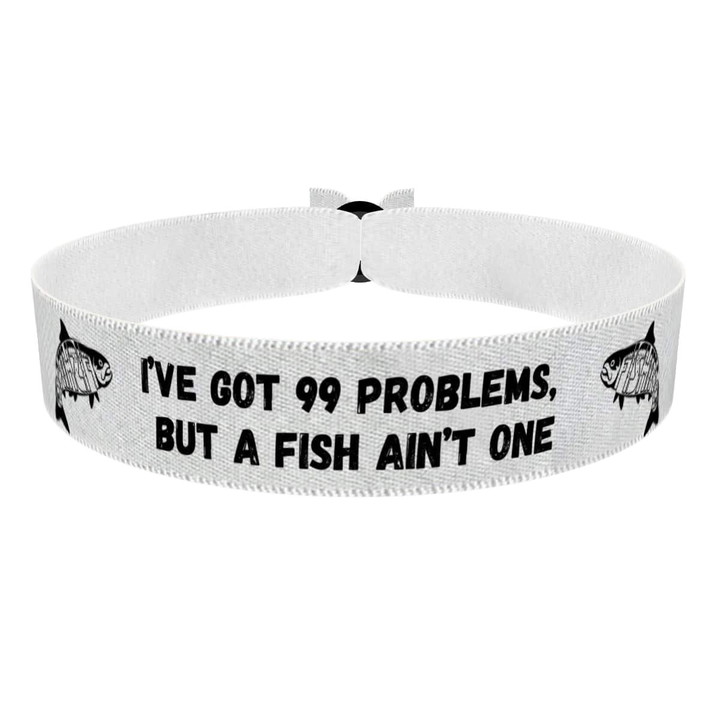 Zum Produkt Stoffarmband mit dem Spruch Ich habe 99 Probleme aber keine Fisch