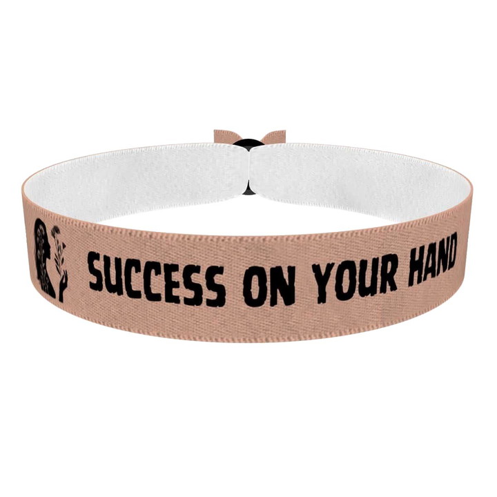 Zum Produkt Stoffarmband mit dem Motiv Erfolg in deiner Hand