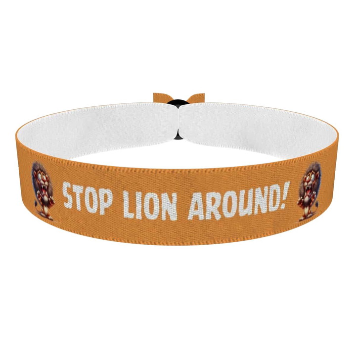 Zum Produkt Stoffarmband mit lustigem Löwenmotiv aus hochwertigem Material