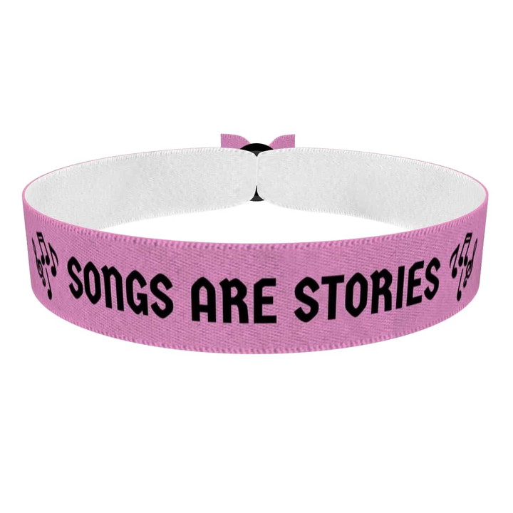 Zum Produkt Stoffarmband Songs are Stories Musiksymbol-Motiv Stoffarmband
