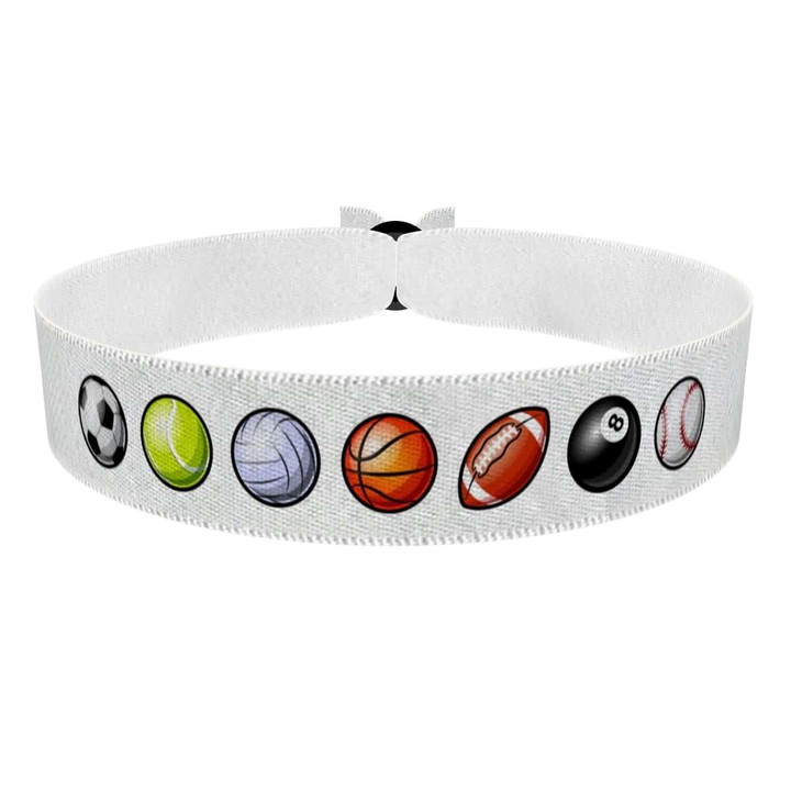 Zum Produkt Sportliches Motiv mit Ballsymbolen Stoffarmband