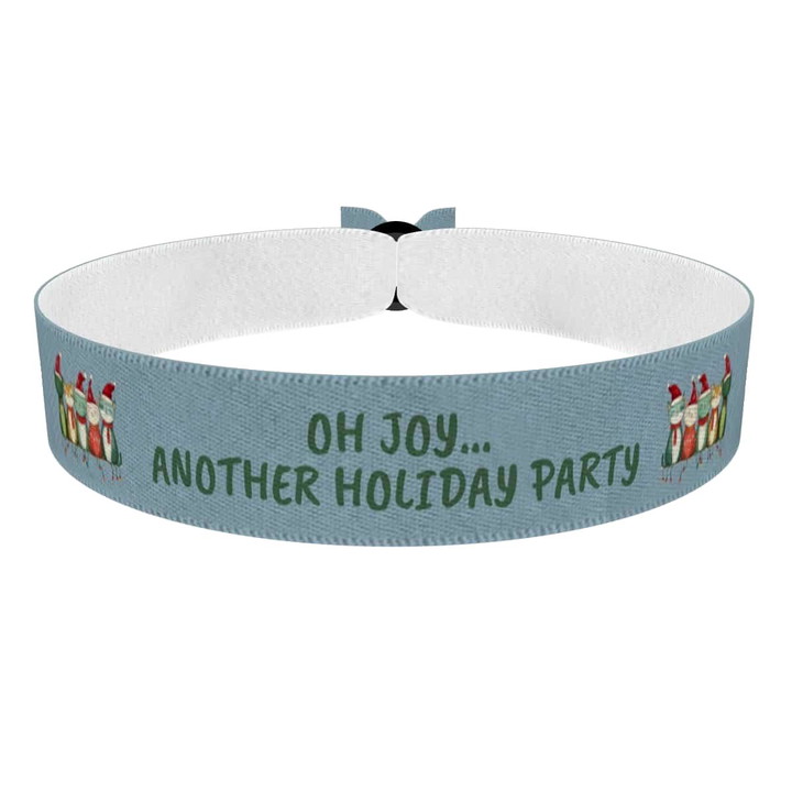 Zum Produkt Weihnachtliche Festtagsstimmung mit bunten Figuren Stoffarmband