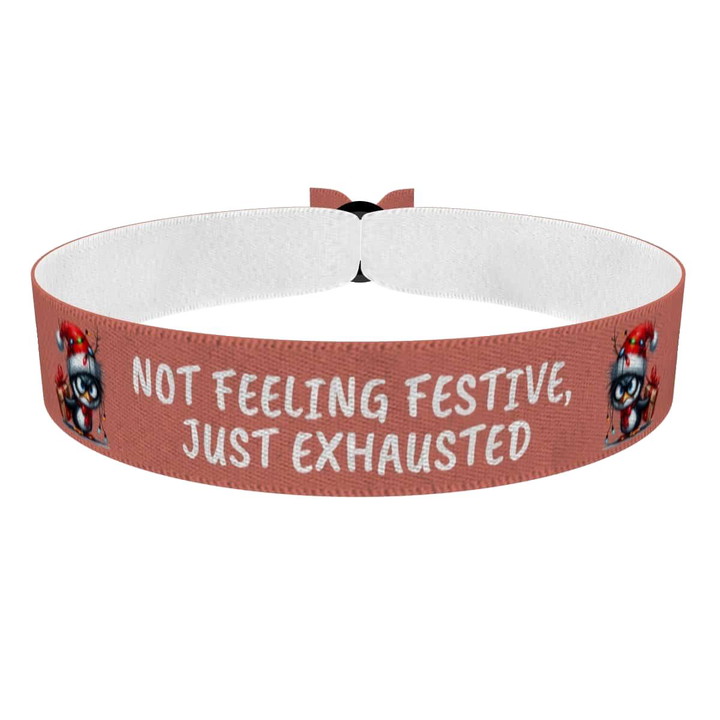 Zum Produkt Weihnachtsmotiv mit müdem Weihnachtskatze Stoffarmband