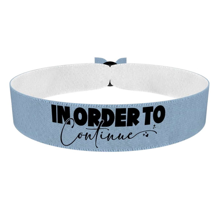 Zum Produkt In order to continue Stoffarmband