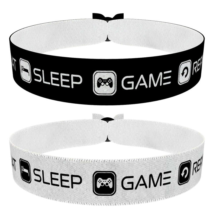 Zum Produkt 2er Set Eat Sleep Game Repeat schwarz/weiß und weiß/schwarz Stoffarmbänder