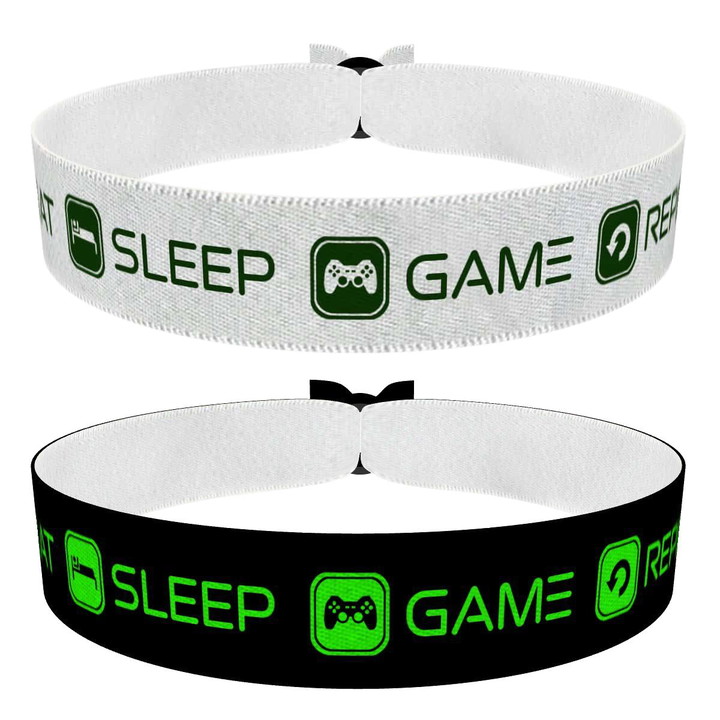 Zum Produkt 2er Set Eat Sleep Game Repeat Stoffarmbänder weiß olive schwarz grün