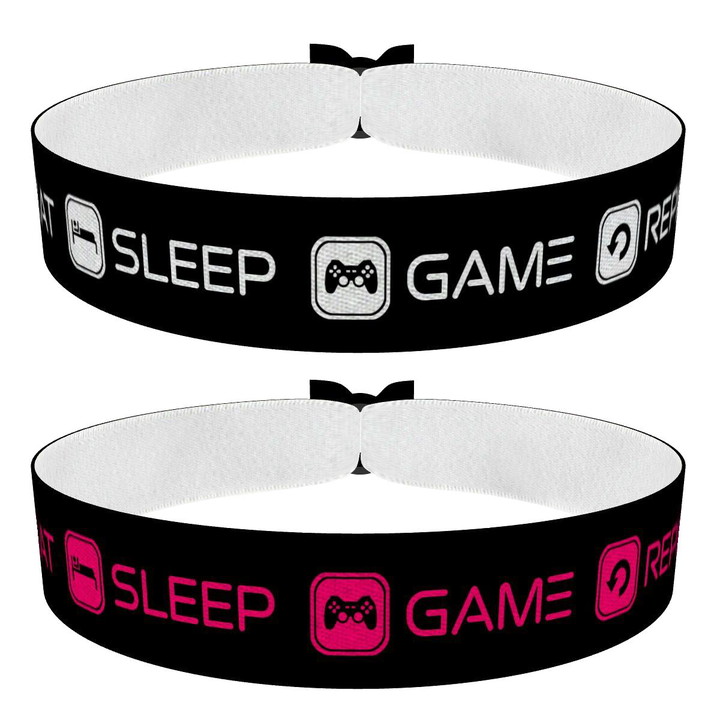 Zum Produkt 2er Set Eat Sleep Game Repeat schwarz/weiß und schwarz/pink Stoffarmbänder