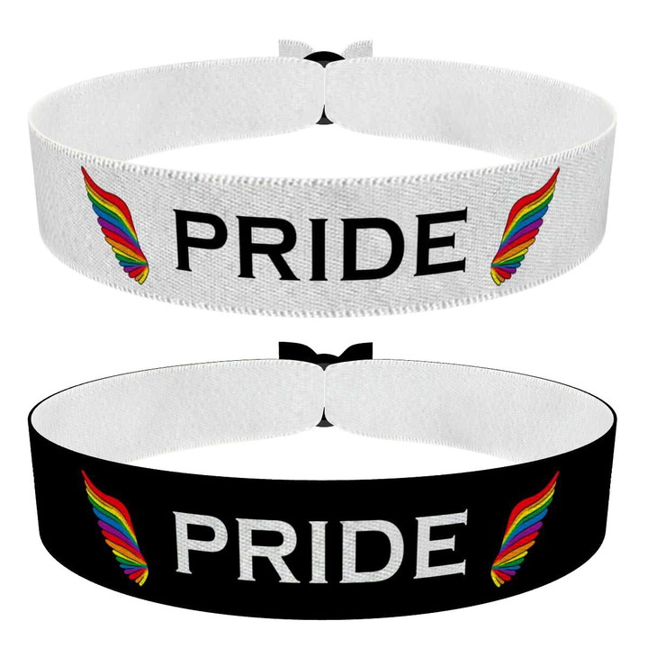 Zum Produkt 2er Set PRIDE Genderflügel Stoffarmbänder in Weiß und Schwarz
